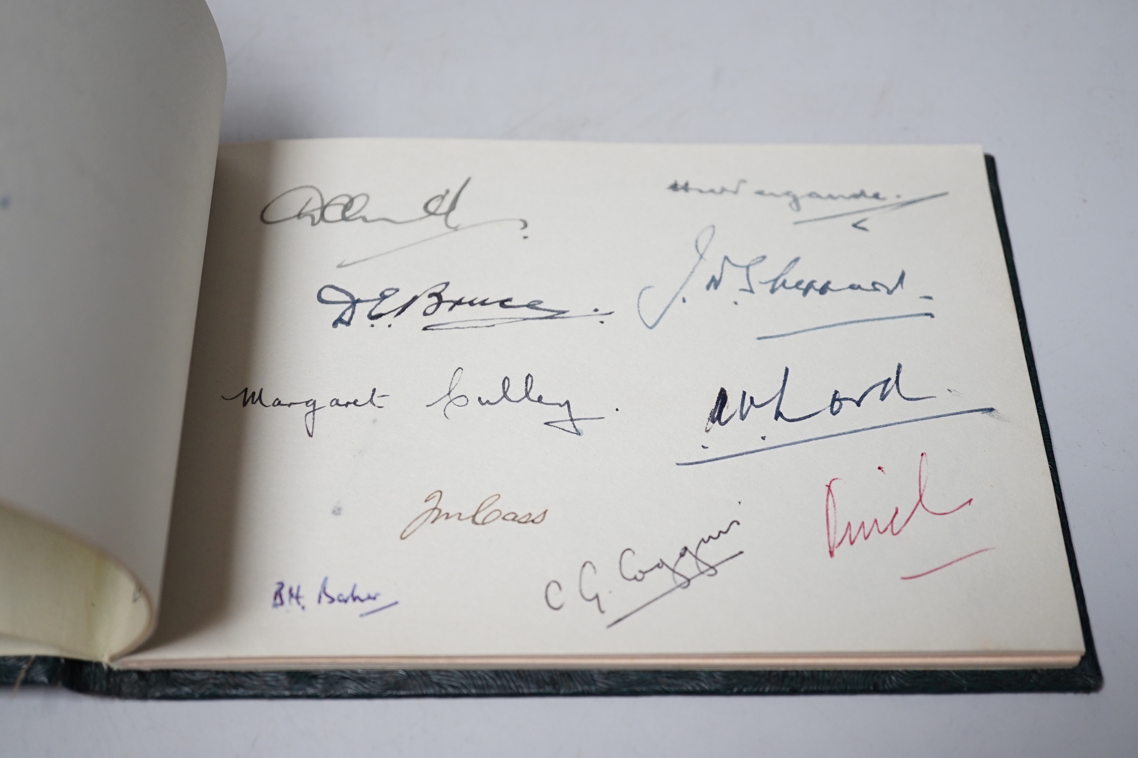 An Autograph book presented to EB Thomas esquire MBE, 4 January 1960 on the occasion of his retirement from public service with the Ministry of housing and local government, signed by his colleagues